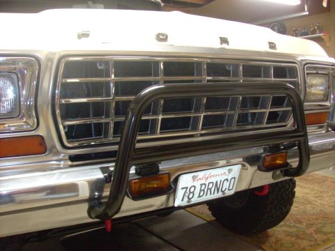 1978 Ford Bronco - Front view of a 1978 Ford Bronco, a bull bar and custom license plate.