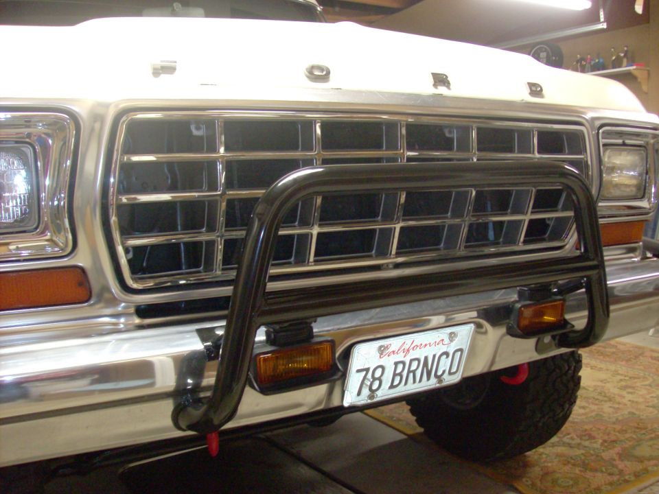 1978 Ford Bronco front grille with bull bar and California license plate reading '78 BRNCO'
