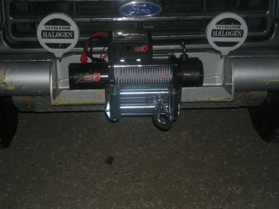 Front bumper with winch and Navigator Halogen lights on a 1991 Ford Bronco