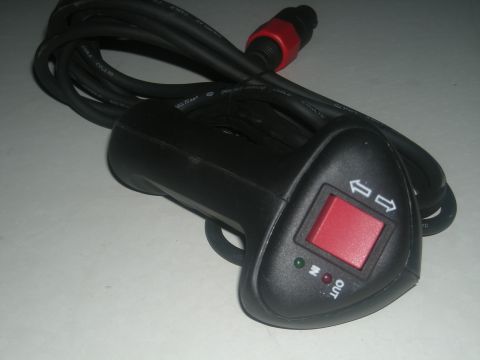 1991 Ford Bronco - This is a wired remote control for a vehicle winch, directional buttons and indicator lights.
