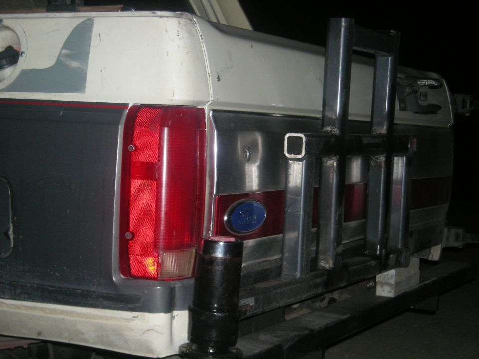 Rear of a 1991 Ford Bronco with a custom metal rack attached