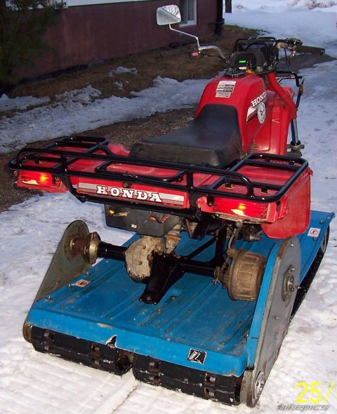 2000 Ford E350 - Honda ATV modified with tracks for winter use.