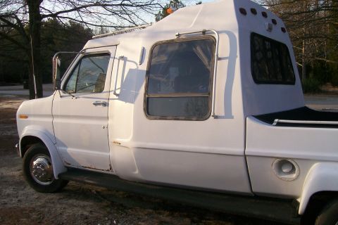 1982 Ford E350 - This custom camper van conversion appears to be from the early 1980s, not 1982.