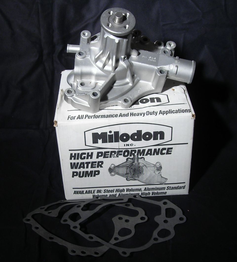 Milodon high performance water pump and gaskets on a box.