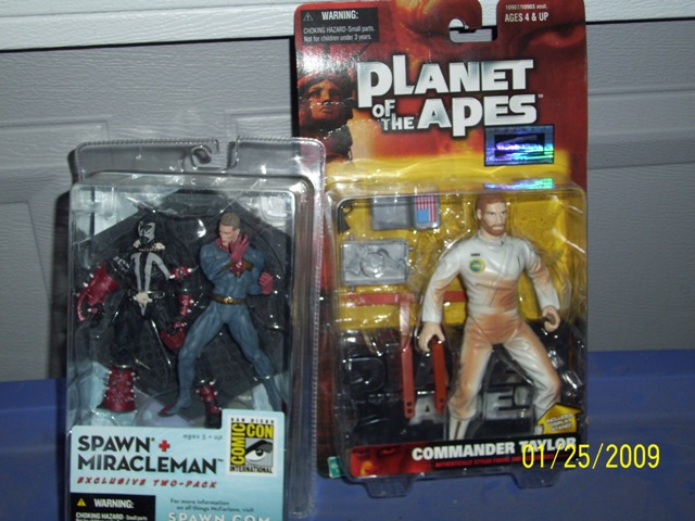 Spawn and Planet of the Apes action figures in packaging