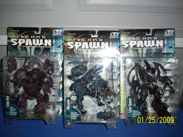 Three Techno Spawn action figures in their packaging.