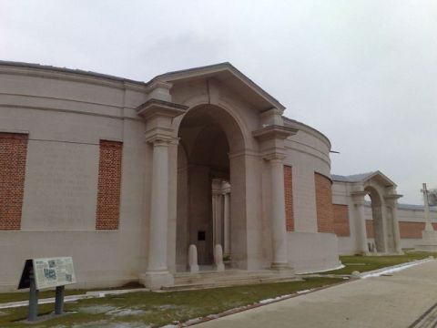1991 Ford LTD Crown Victoria - Photograph of a war memorial building with columns and engraved walls, not a technical document.