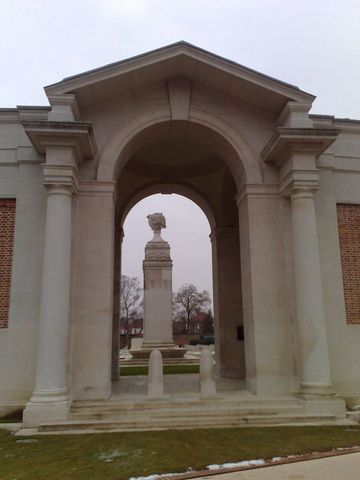1991 Ford LTD Crown Victoria - Photograph of a memorial archway and monument, not a technical document.