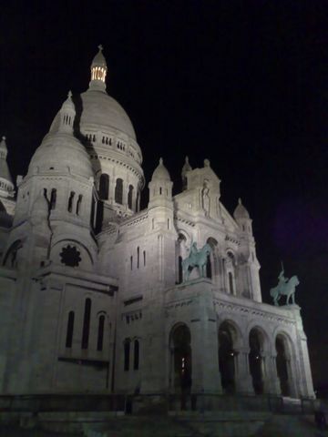 1991 Ford LTD Crown Victoria - Nighttime photograph of the Sacre-Coeur basilica, not a technical document.