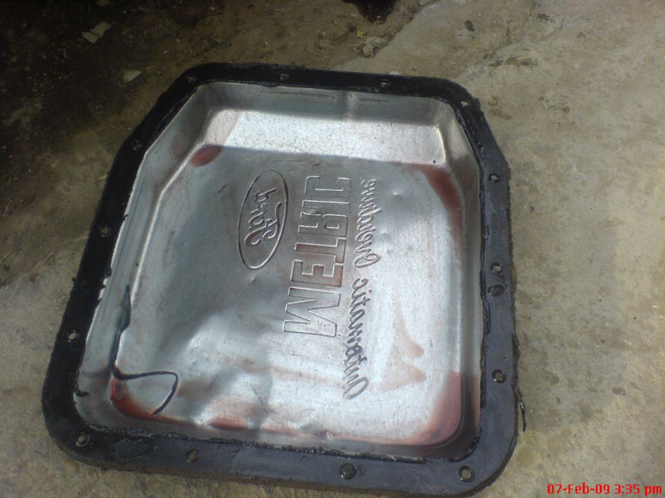 clean pan and remove the old gasket