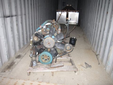 1992 Ford Bronco - Photograph of an engine on a pallet, not a technical document.