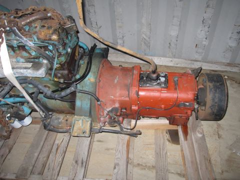 1992 Ford Bronco - Photograph of an engine and transmission on a pallet, not a technical document.