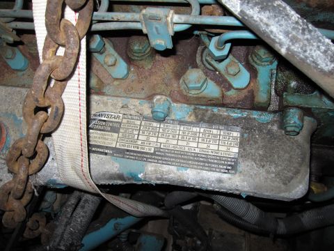1992 Ford Bronco - Navistar emission control information data plate listing engine model, displacement, idle speed and valve lash specifications.