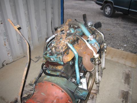 1992 Ford Bronco - Photograph of a diesel engine on a pallet, not a technical document.