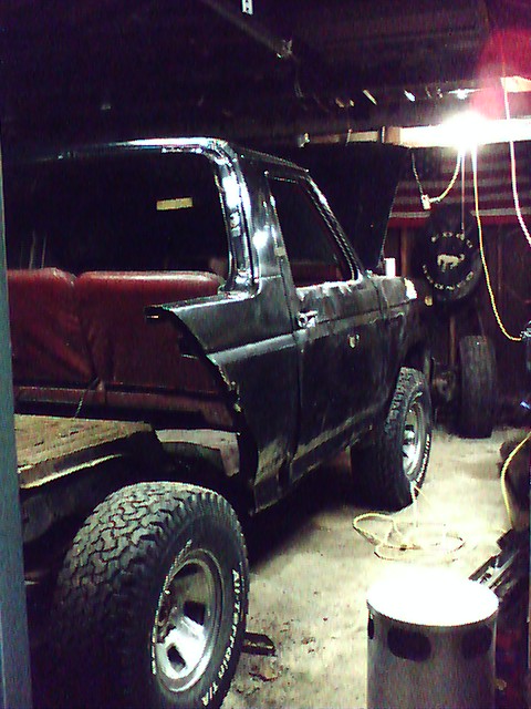 1985 Ford Bronco - This Ford Bronco appears to be undergoing some work in a garage setting.
