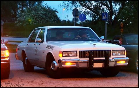 1998 Ford Crown Victoria - This police car appears to be from the 1980s, not a 1998 model.