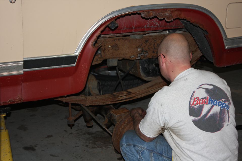Taking rear suspension apart
