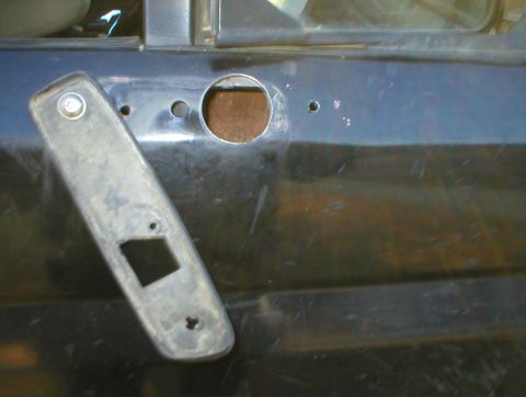 1983 Ford Bronco - Then swing the gasket out of the way and cut the support arm hole. Note that I drilled the spot welds for the original nut plate first and…