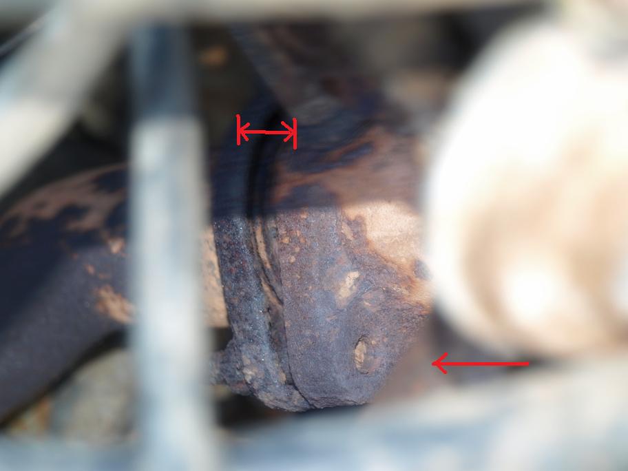 Exhaust manifold into pipe to cat. That headless bolt and gap can't be good...
