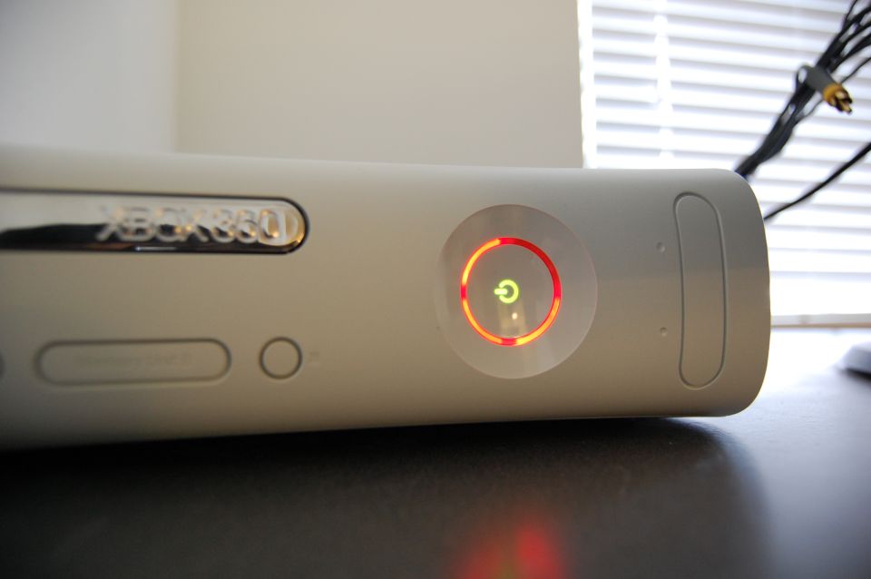Xbox 360 console with the power light showing red rings