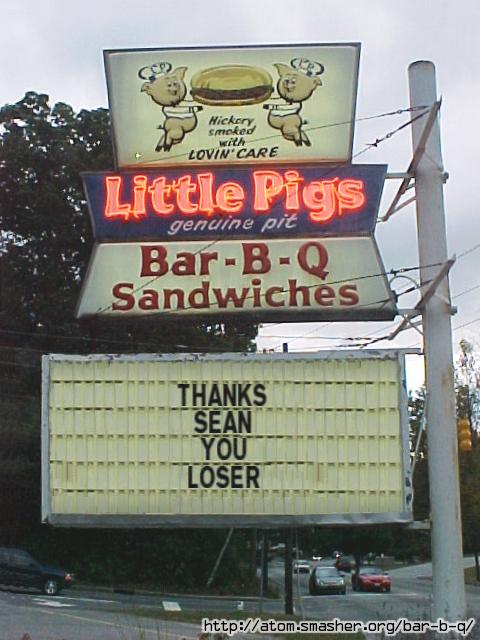 1973 Ford Ranchero - A roadside sign for Little Pigs Bar-B-Q advertises sandwiches and displays a message board.