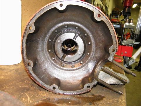 1912 Ford Model T - A disassembled differential housing sits on a workbench, awaiting rebuild.