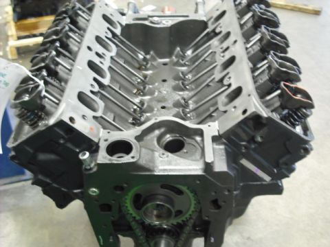 1979 Ford Bronco - Close-up of an engine block, showing internal components and a timing chain.