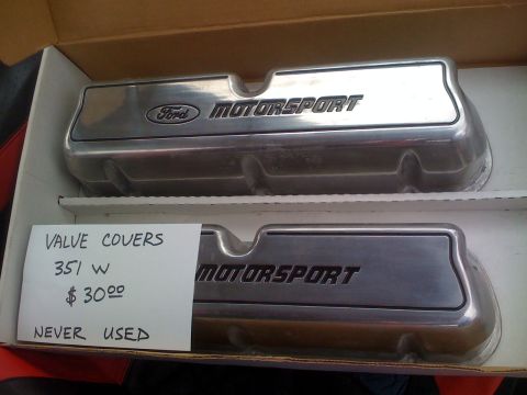 1983 Ford Bronco - Two polished aluminum Ford Motorsport valve covers are shown in a cardboard box. A handwritten note on the lower valve cover reads "VALUE C…