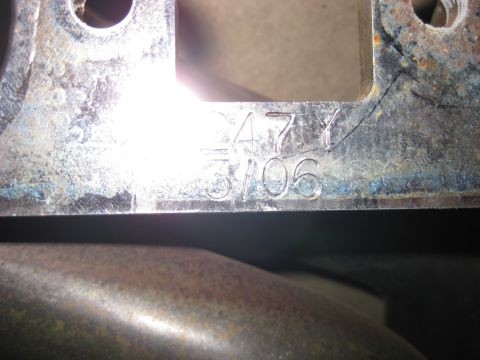1979 Ford Bronco - Stamped metal with the characters "47Y" and "3106" are visible on the surface. The metal appears to be part of a vehicle component, possibl…