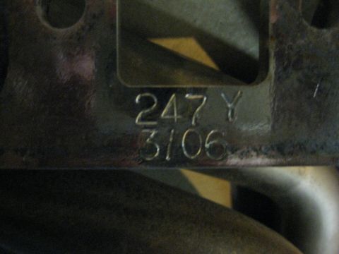 1979 Ford Bronco - A close-up shot shows stamped numbers and letters on a metallic surface. The visible text reads "247 Y" on the top line and "3/06" on the b…