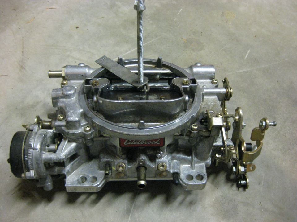 Edelbrock carburetor on concrete floor