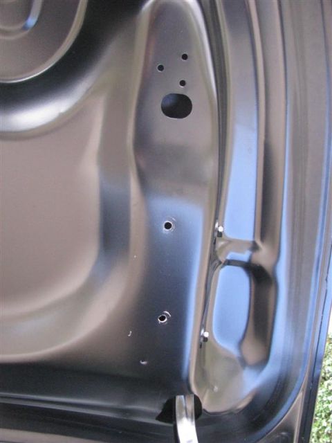 2003 Mercury Marauder - 1/4" holes drilled in trunk lid.