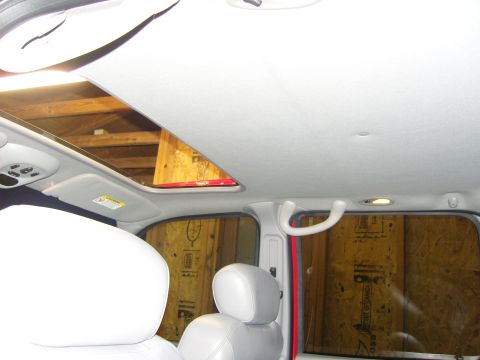 2007 Ford Mustang - Photograph of a vehicle gray headliner interior, not a technical document.