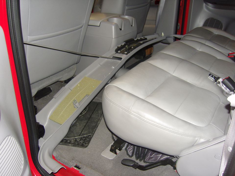 Photo of a truck rear bench seat in gray leather