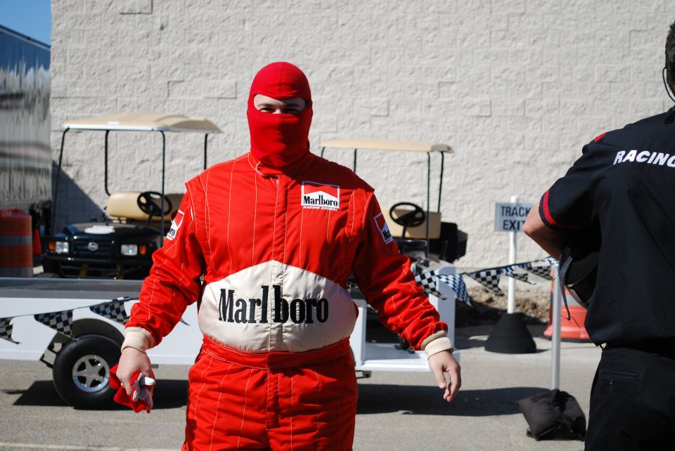 Person in red suit with Marlboro logo