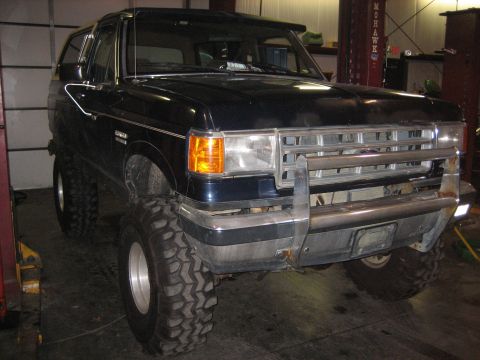 1990 Ford Bronco - This 1990 Ford Bronco is modified with large tires and a lifted suspension.