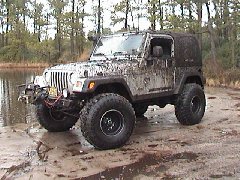 2004 Jeep Wrangler - This Jeep Wrangler is covered in mud after off-roading.
