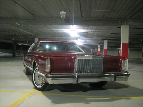 1988 Mercury Grand Marquis - This 1977 Lincoln Continental Mark V coupe is seen from the front in a parking garage.
