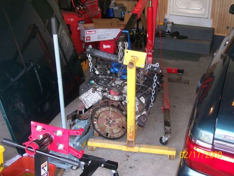 1995 Mercury Grand Marquis - Engine removed from a vehicle and mounted on an engine stand for service or repair.