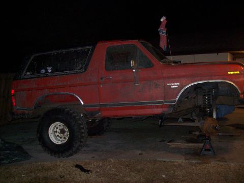 1986 Ford Bronco - This 1986 Ford Bronco is undergoing maintenance with its front wheel assembly removed.