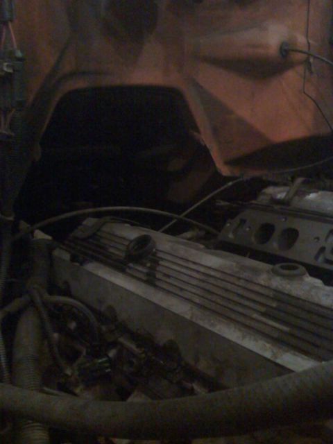 1992 Ford Bronco - Close-up view of an engine bay, showing mechanical components.