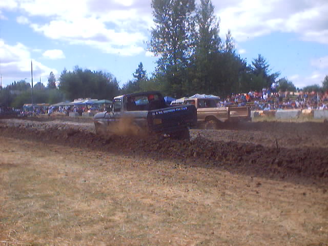 1976 Ford F-100 in mud drag race, 3q-front view