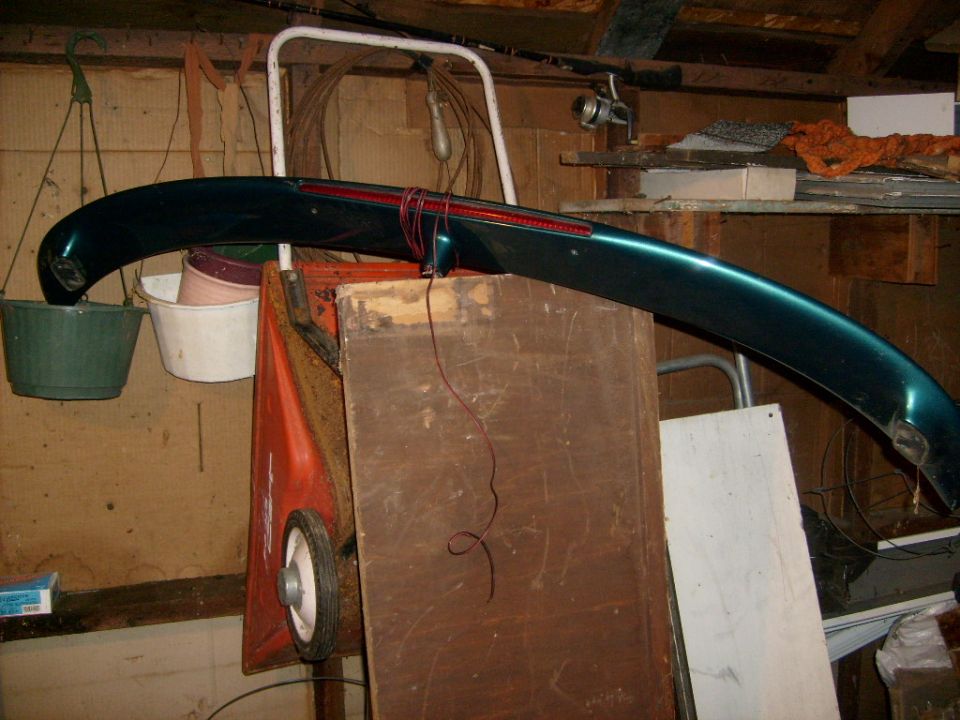Green rear spoiler with red brake light strip