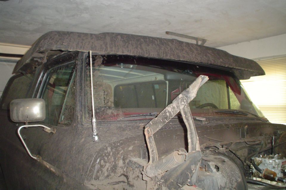 1978 Ford Bronco front end, hood open, showing engine components
