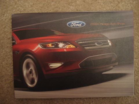 1998 Ford Taurus - Brochure cover shows a red Ford sedan with "2009 Chicago Auto Show" text.