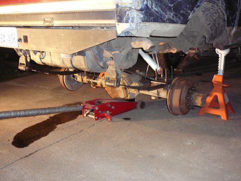 1991 Ford Bronco - Rear suspension and axle work in progress on a vehicle.