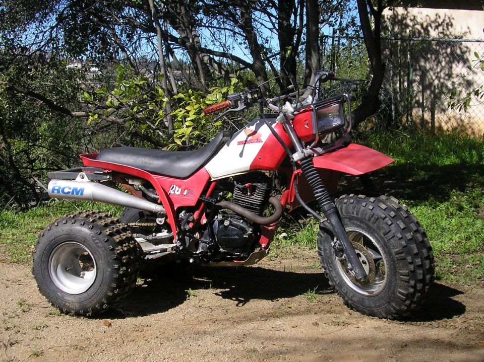 Red Honda Big Red three-wheeler ATC parked outdoors
