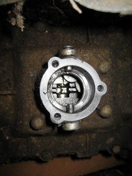 2004 Ford F-150 - This image shows a close-up view of an internal transmission component, revealing intricate gears within the mechanism.