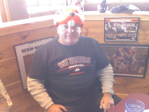 2008 Kawasaki Ninja R - A person wearing a beaver mascot hat and an OSU Beavers t-shirt is seated indoors.
