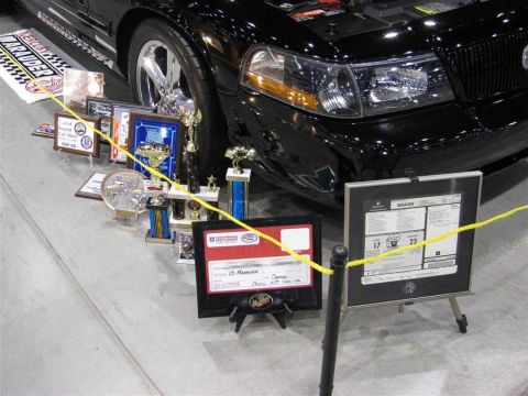 2003 Mercury Marauder - Window sticker and trophies.